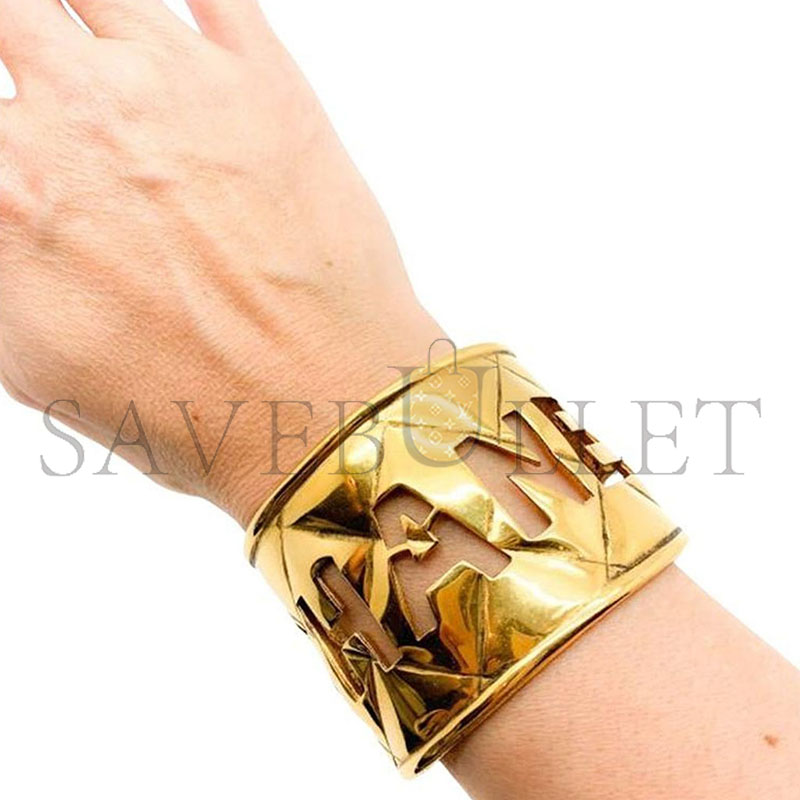 CHANEL VINTAGE GOLD CUT OUT LOGO STATEMENT CUFF 1980S